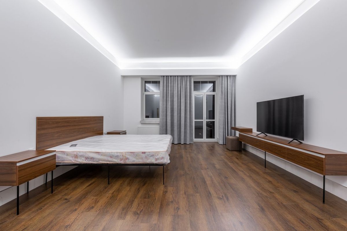 bedroom with wood vinyl flooring