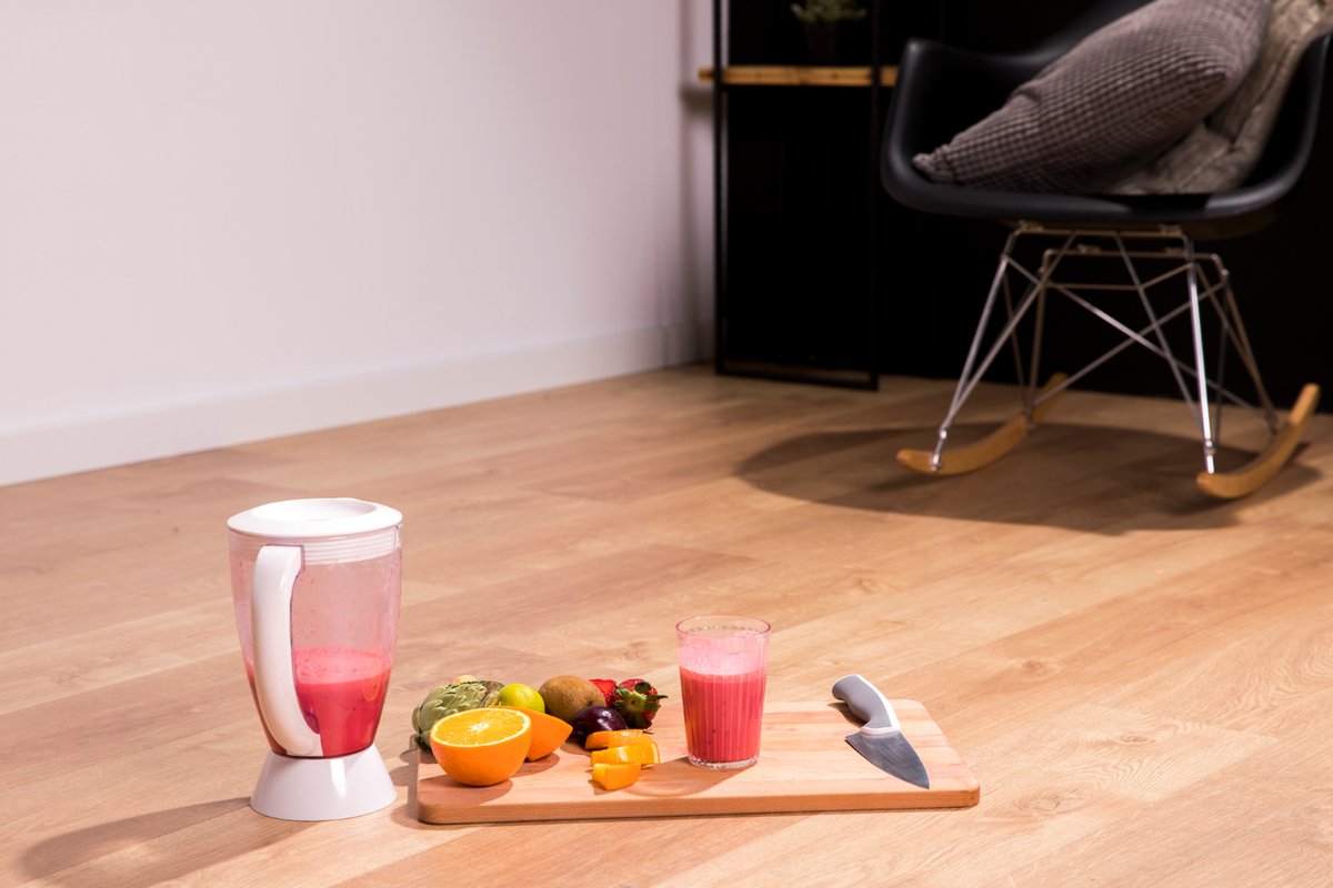 juicing detox lying on the vinyl flooring